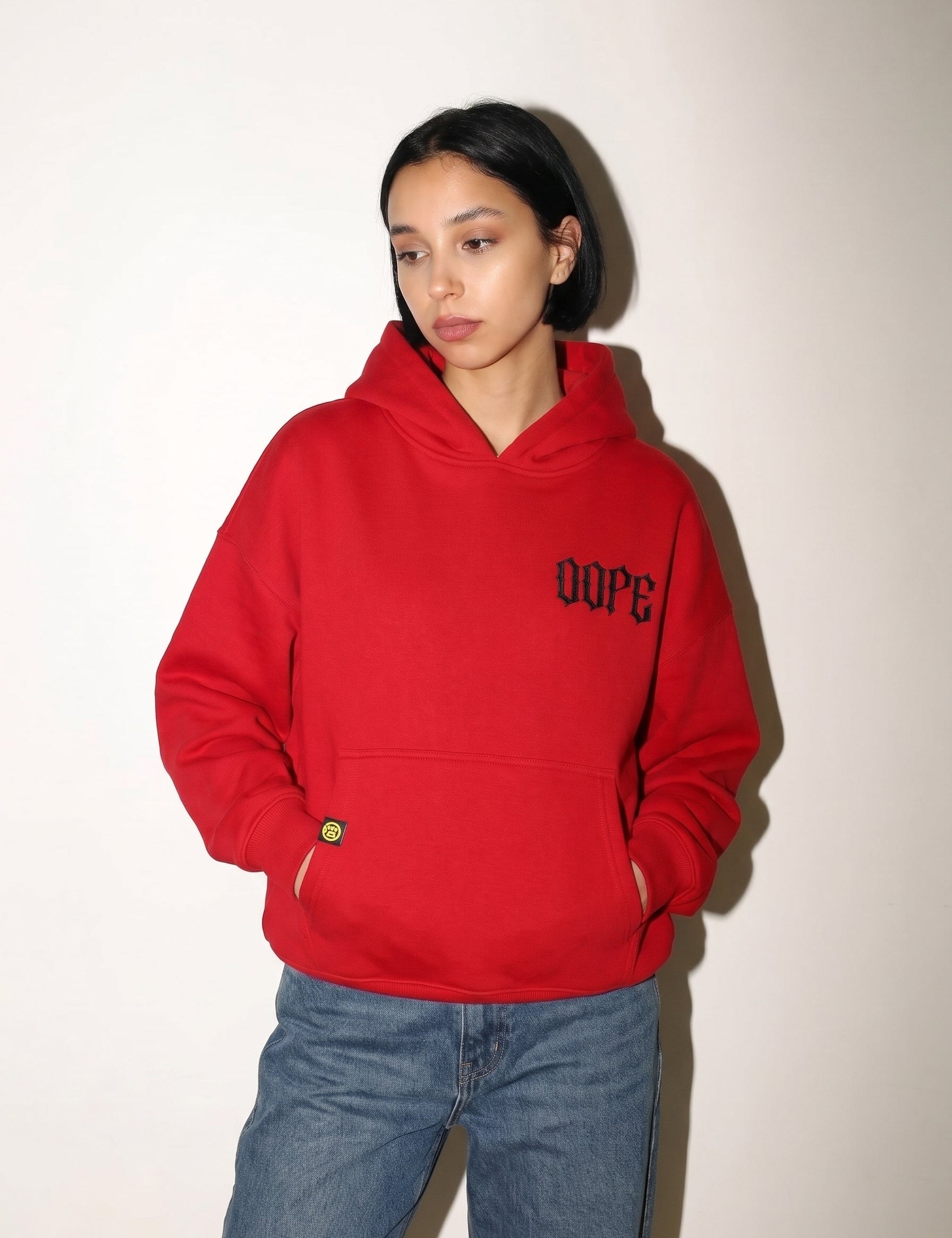 Red 222 angel number hoodie by Dope Beyond – front view on female model