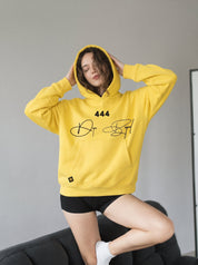 Yellow 444 angel number hoodie by Dope Beyond – front view on female model