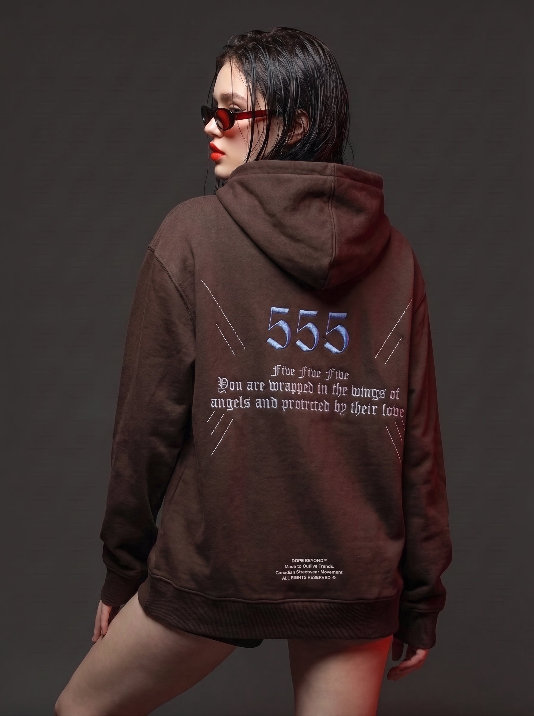 Brown 555 angel number hoodie by Dope Beyond – back view on female model