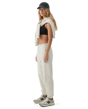Ecru melange Signature heavyweight joggers by Dope Beyond – front view on female model