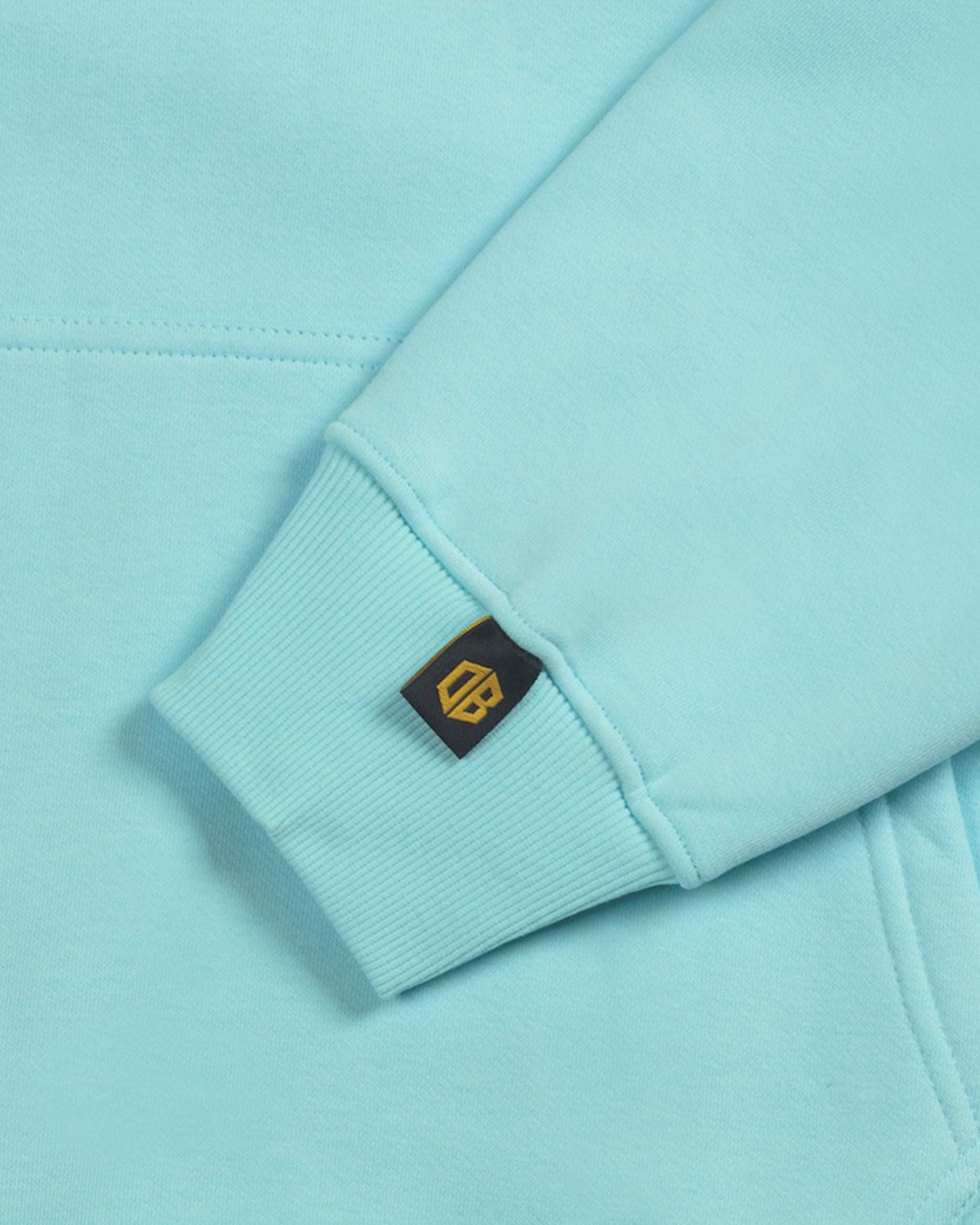 Dope Beyond aqua blue heavyweight hoodie sleeve with logo tag, streetwear detail