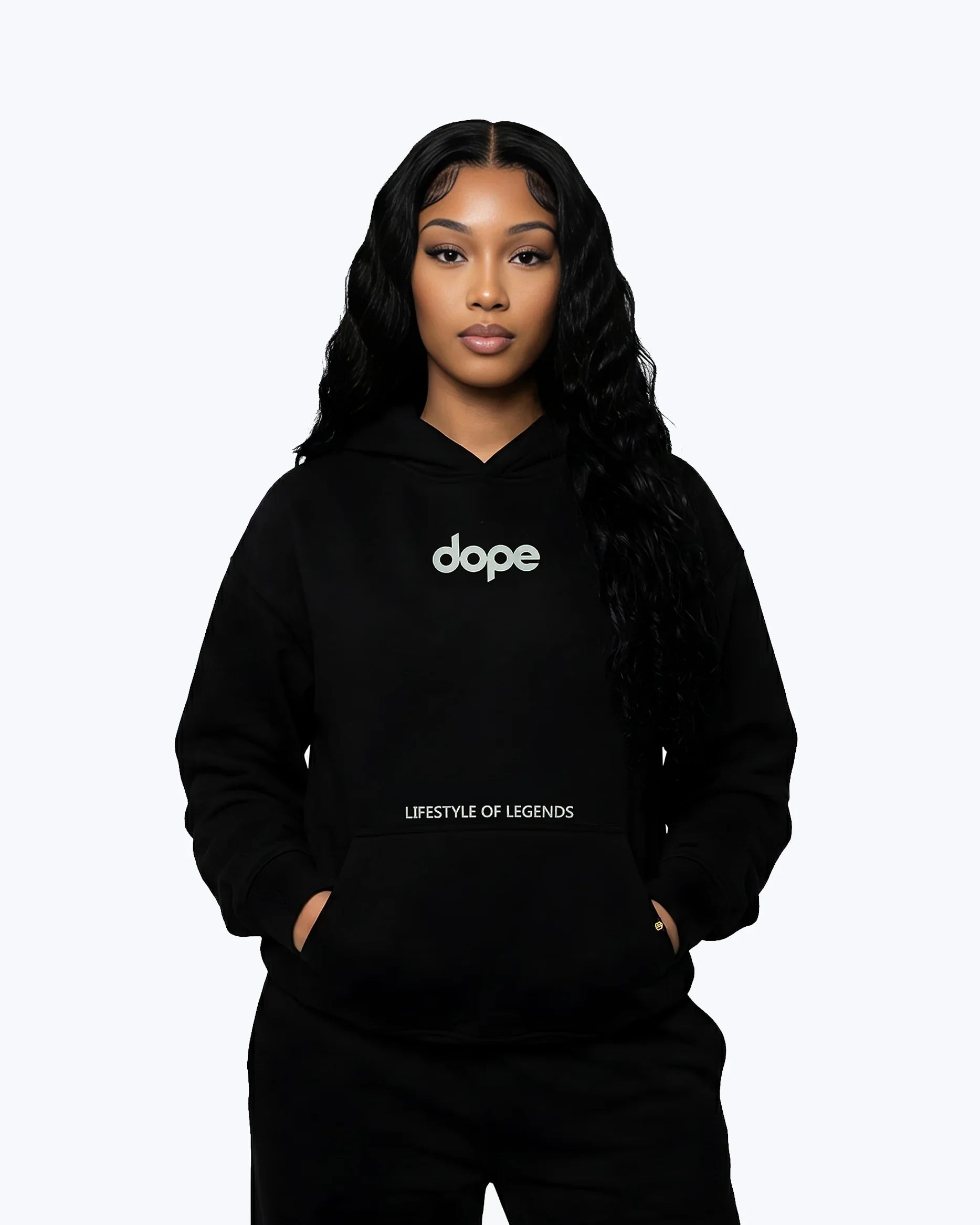 Woman wearing Dope Beyond black heavyweight hoodie with 'dope' and 'lifestyle of legends' text
