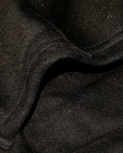 Close-up texture of Dope Beyond heavyweight black streetwear hoodie fabric detail