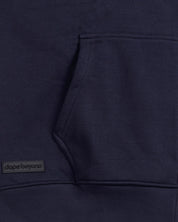 Dark blue heavyweight hoodie kangaroo pocket with dopebeyond streetwear logo patch