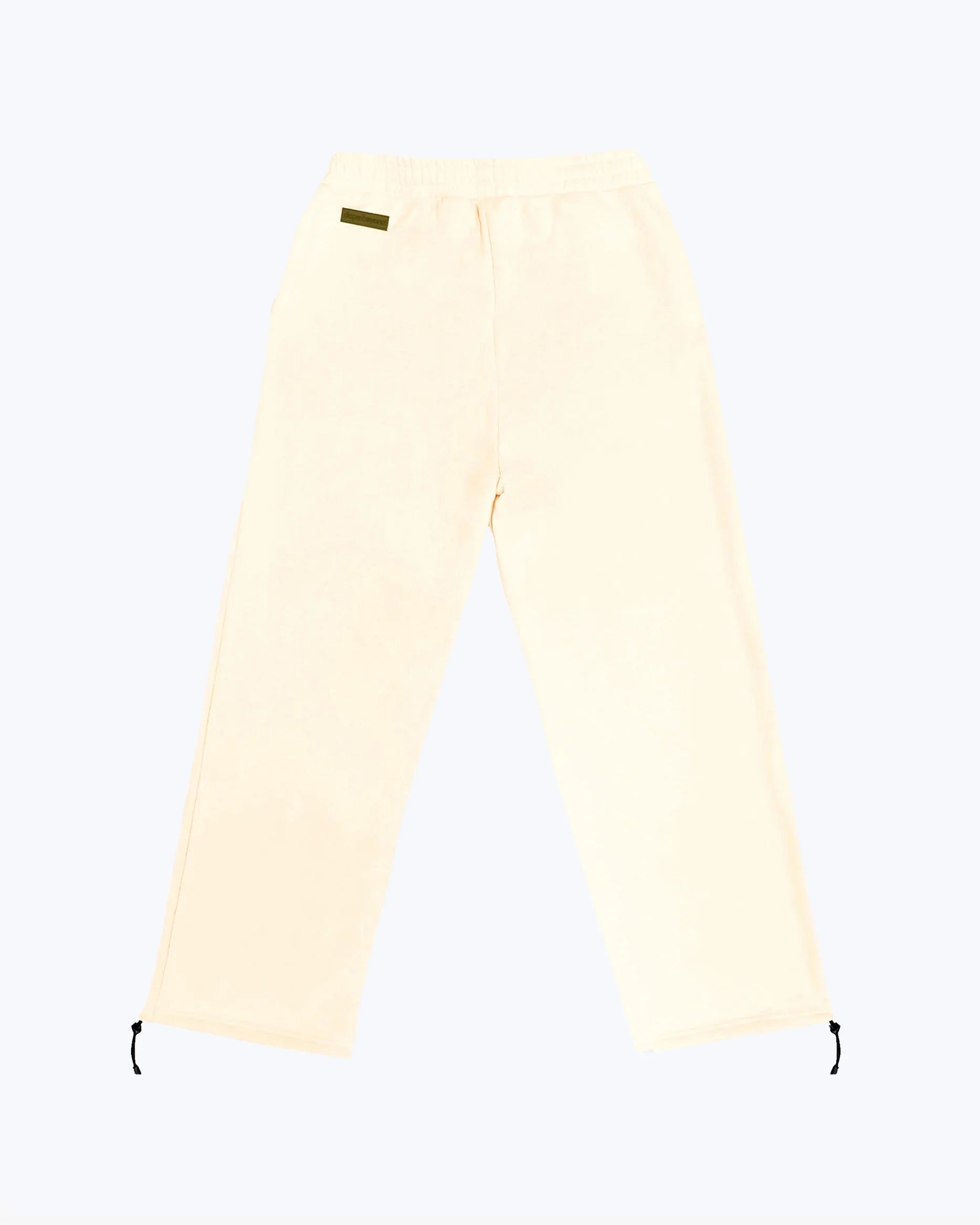 Beige heavyweight jogger pants with drawstring cuffs, streetwear by DopeBeyond