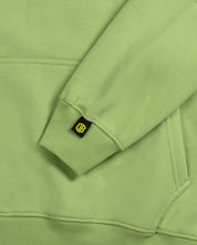 Dope Beyond green heavyweight streetwear hoodie sleeve detail with logo tag
