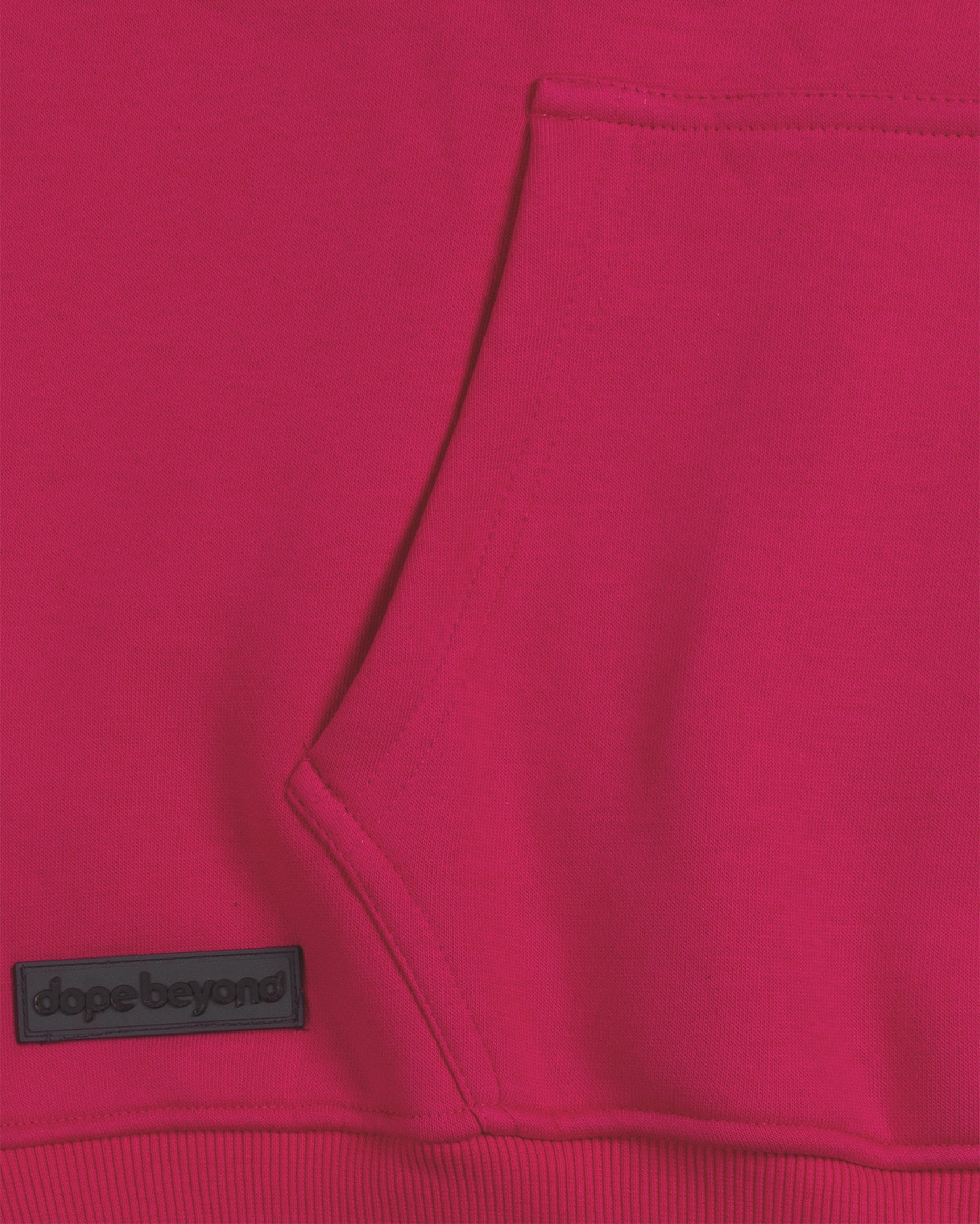 Bright pink hoodie with dopebeyond logo patch and kangaroo pocket, streetwear fashion