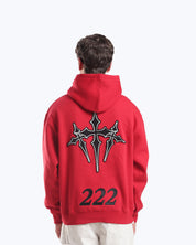 Red 222 angel number hoodie by Dope Beyond, on model front