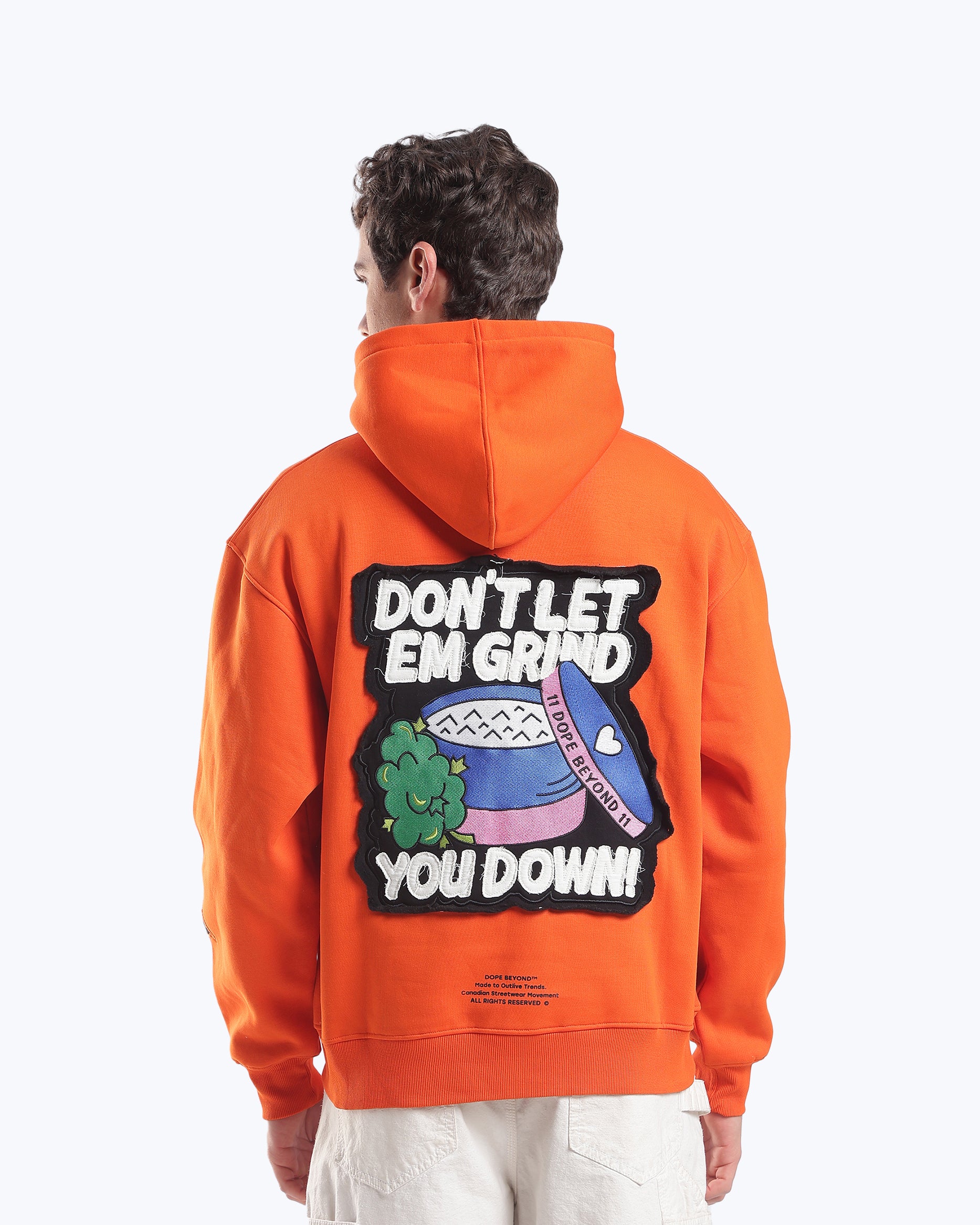Orange Skull in Bloom graphic hoodie by Dope Beyond, back graphic detail