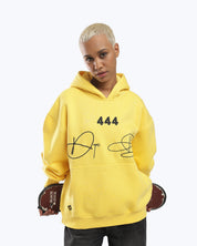 Yellow 444 angel number hoodie by Dope Beyond, on model front