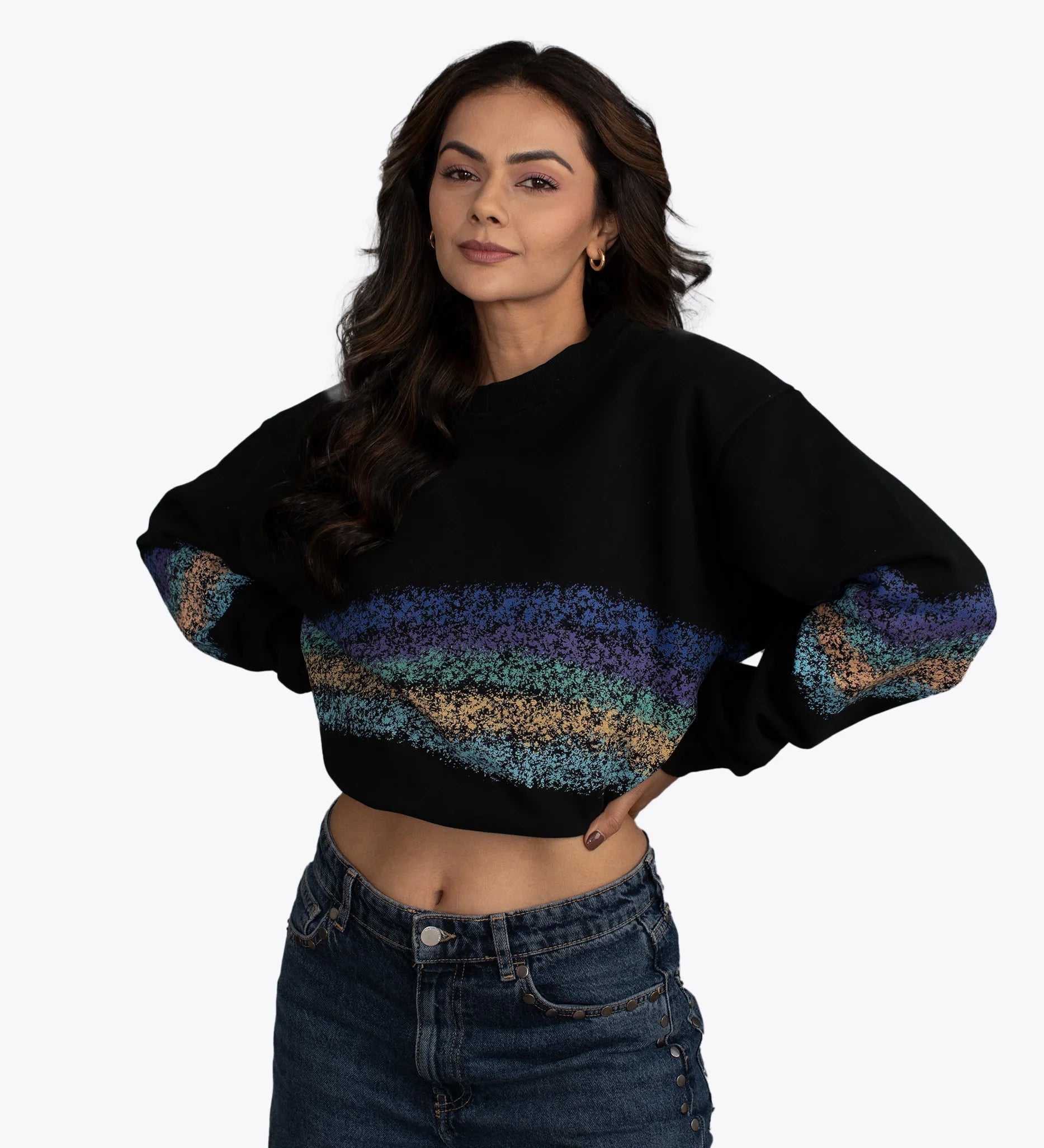 Woman modeling black cropped hoodie with colorful textured stripes, dopebeyond streetwear style