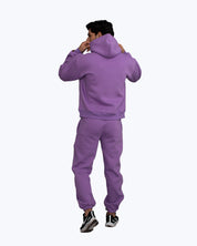 Man wearing purple streetwear hoodie and joggers set, dopebeyond high-frequency apparel