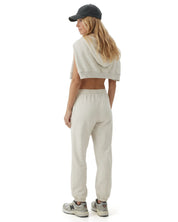 Ecru melange Signature heavyweight joggers by Dope Beyond – back view on female model