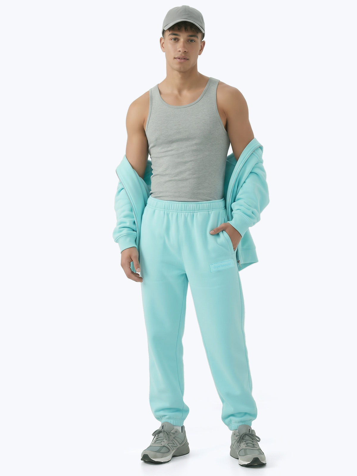 Aqua blue Signature heavyweight joggers by Dope Beyond – front view on male model