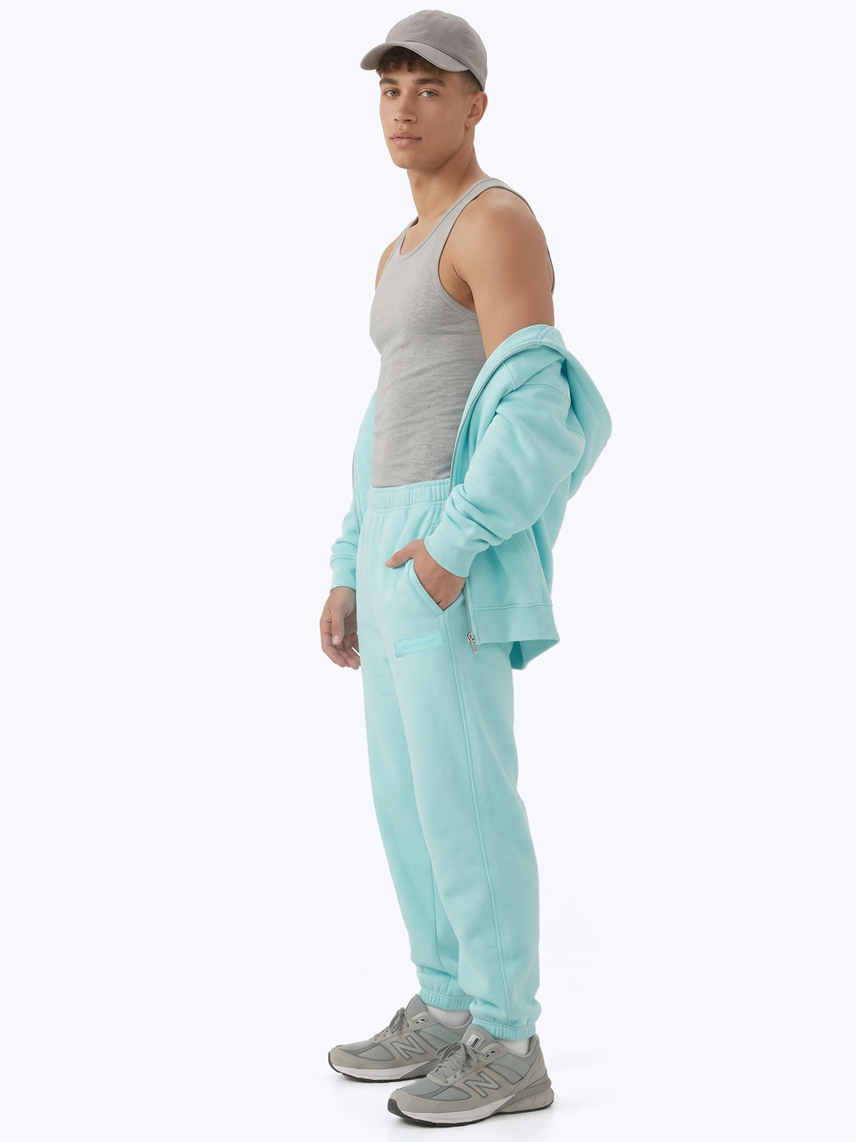 Aqua blue Signature heavyweight joggers by Dope Beyond – side view on male model
