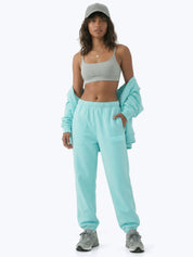 Aqua blue Signature heavyweight joggers by Dope Beyond – front view on female model