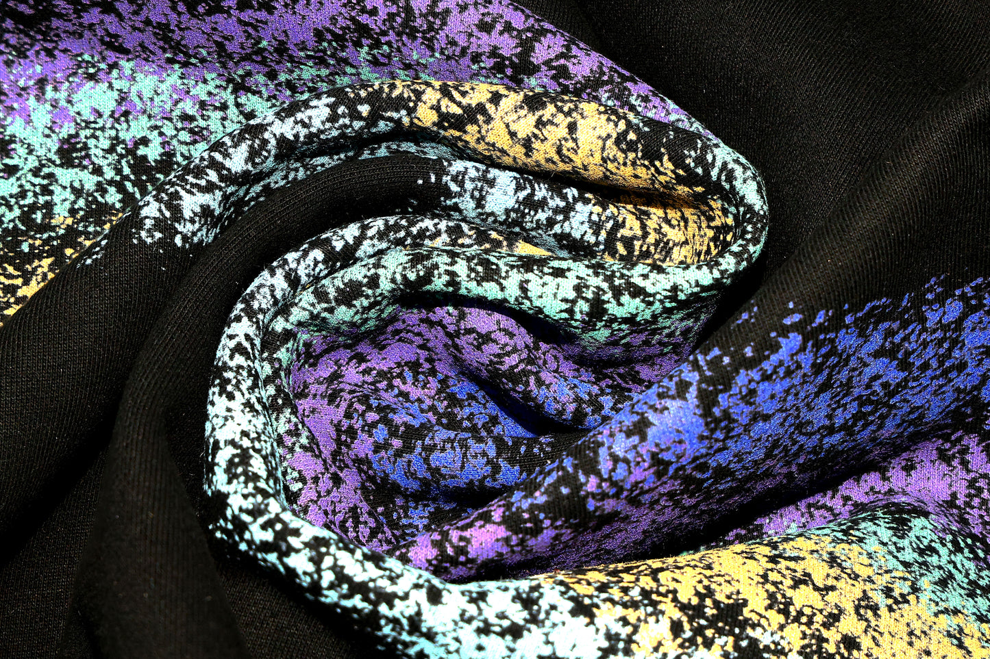 Close-up of colorful textured fabric detail on Dope Beyond Crewneck Sweatshirt in black