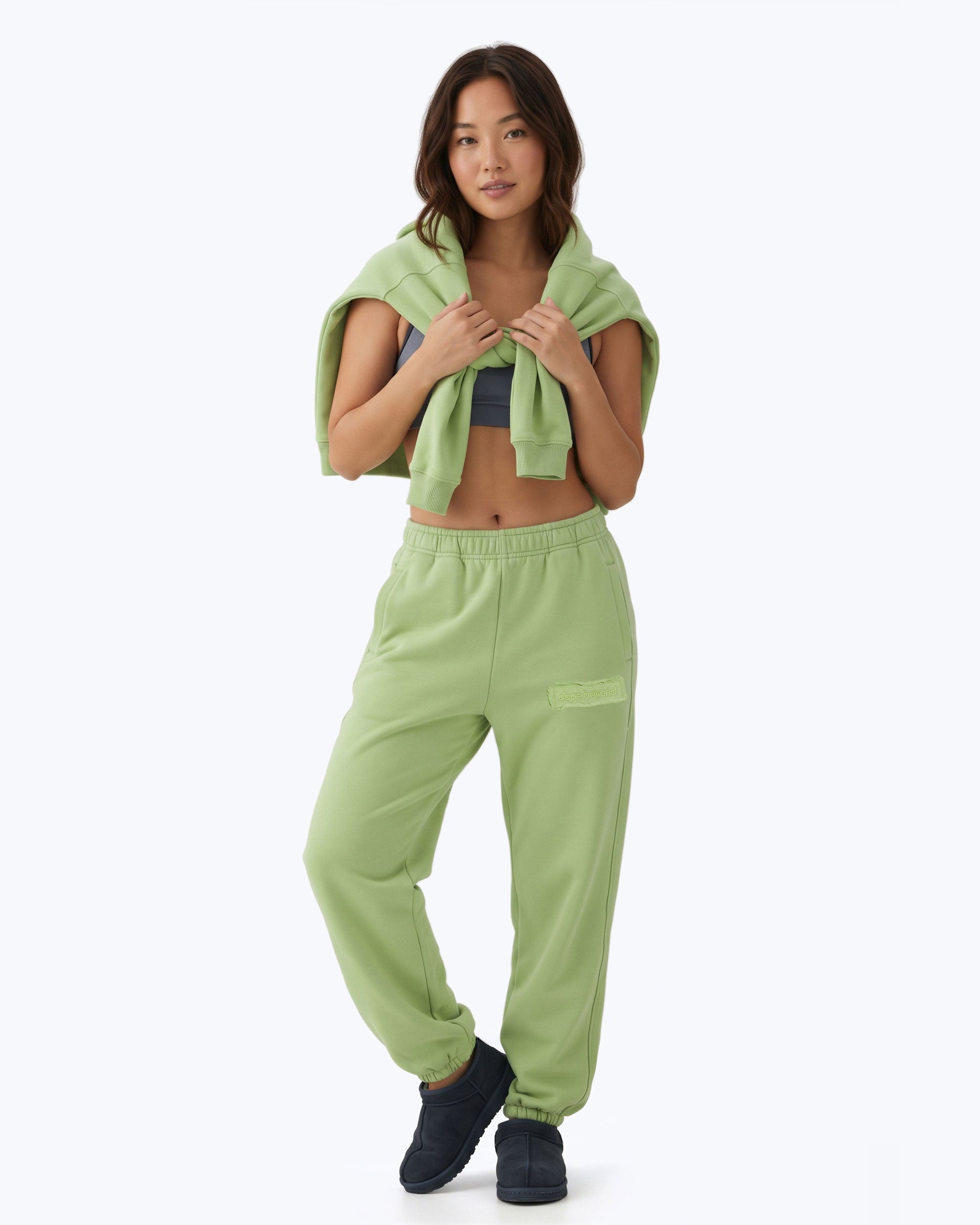 Mint green Signature heavyweight joggers by Dope Beyond – front view on female model