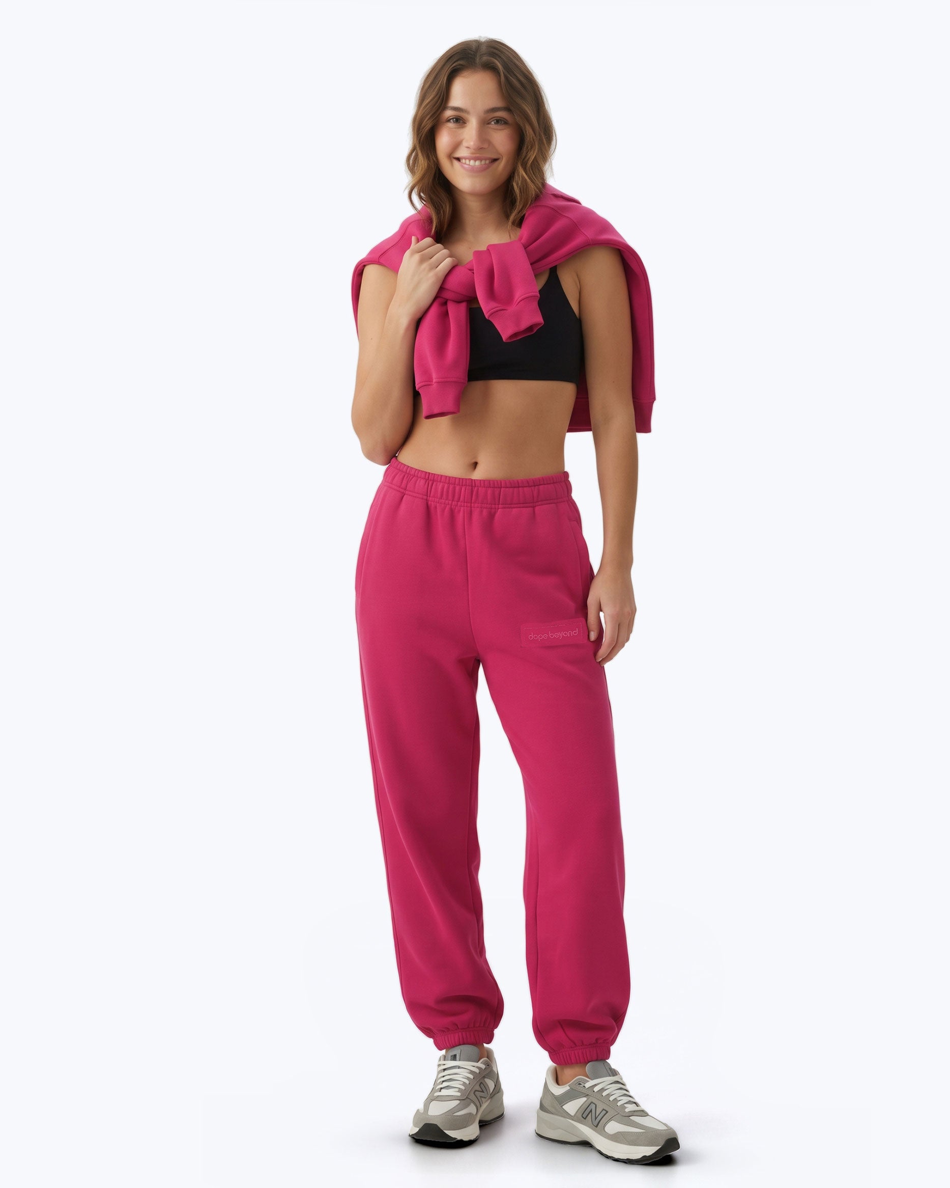 Hot pink Signature heavyweight joggers by Dope Beyond – front view on female model