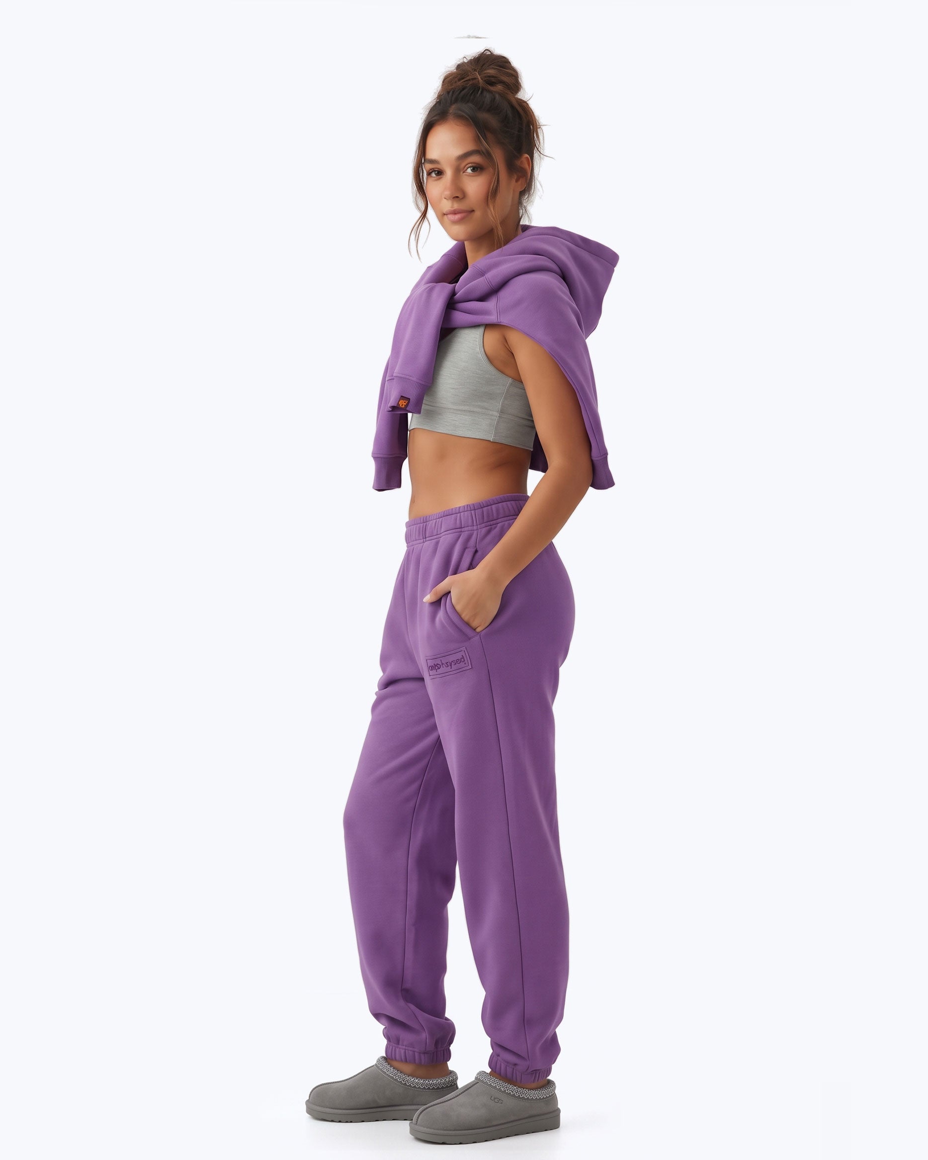 Lavender Signature heavyweight joggers by Dope Beyond – side view on female model