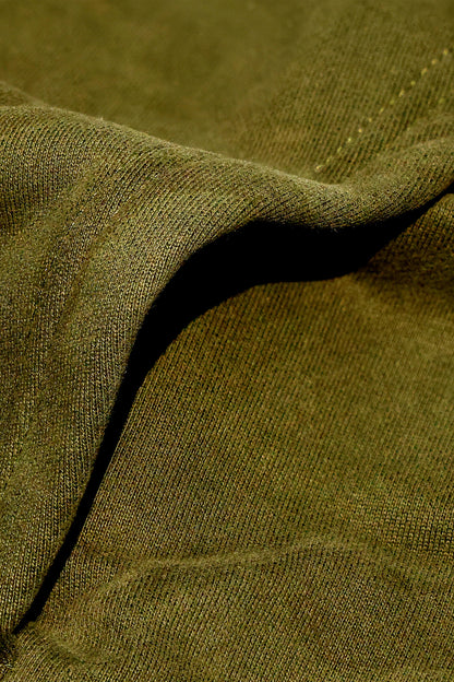 Close-up texture of dopebeyond Lifestyle of Legends Hoodie - Olive Green fabric showing soft knit details