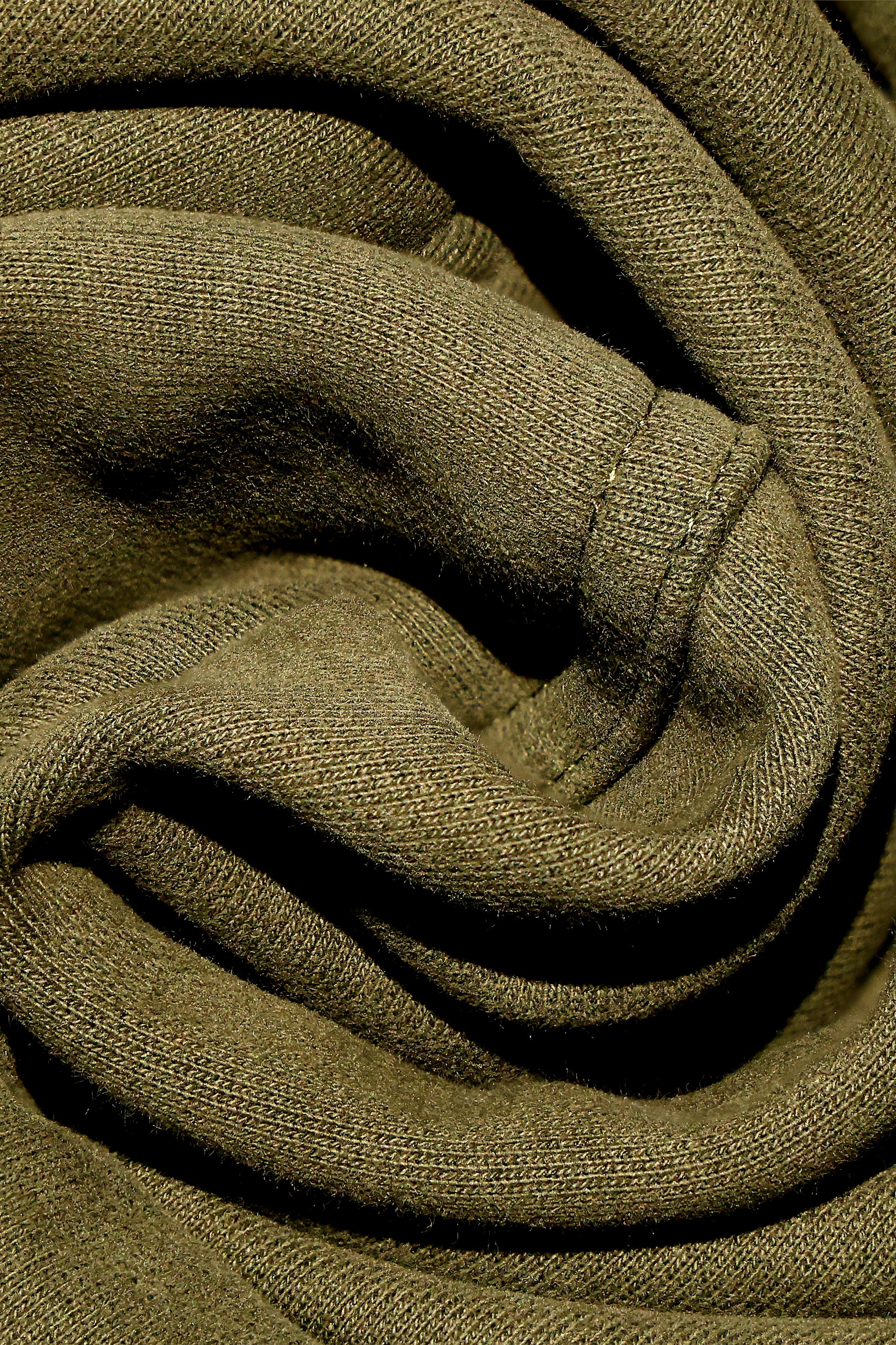 Close-up of olive green fabric texture from the Lifestyle of Legends Hoodie by dopebeyond