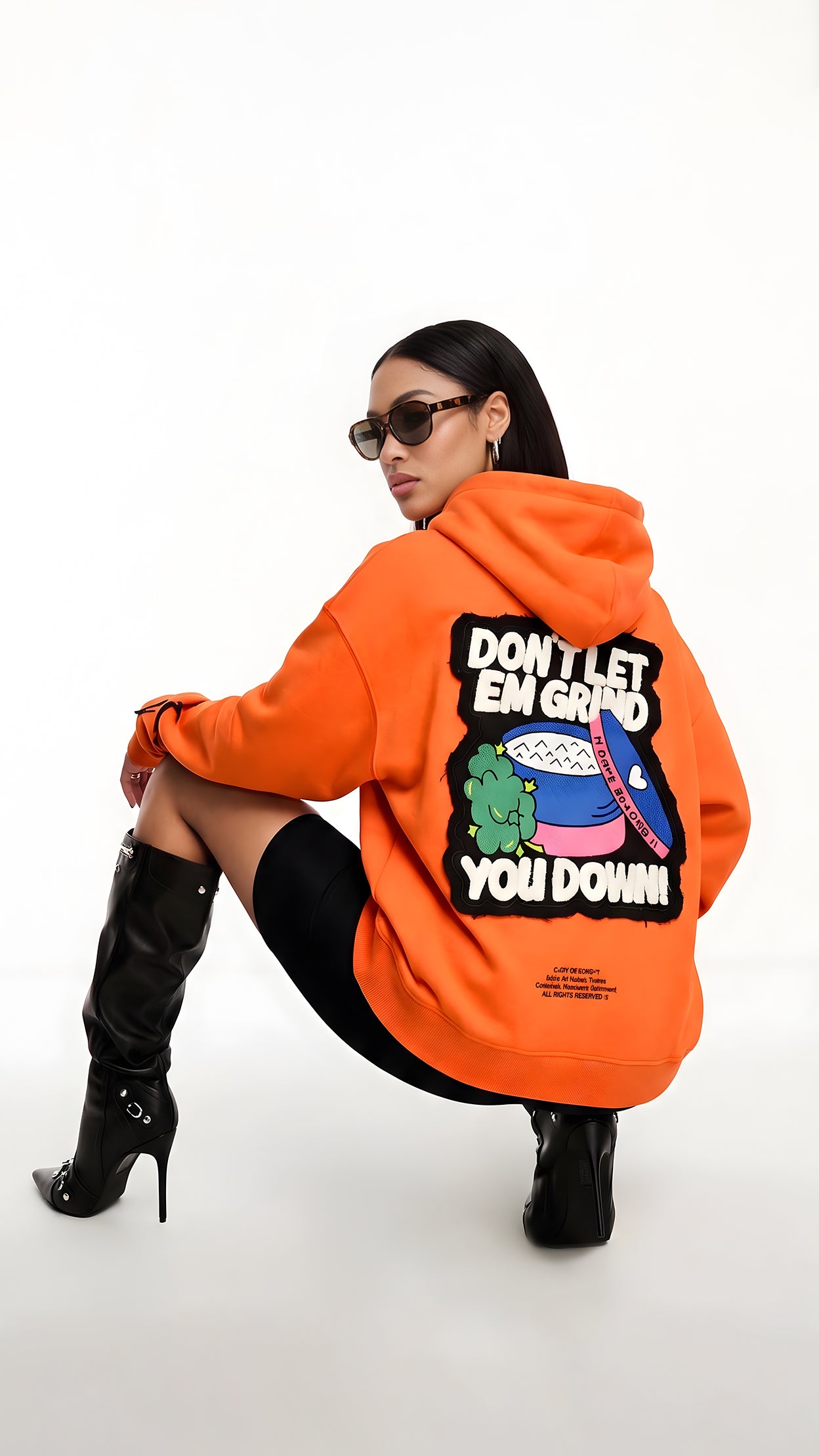 Orange Skull in Bloom hoodie by Dope Beyond – back view on female model